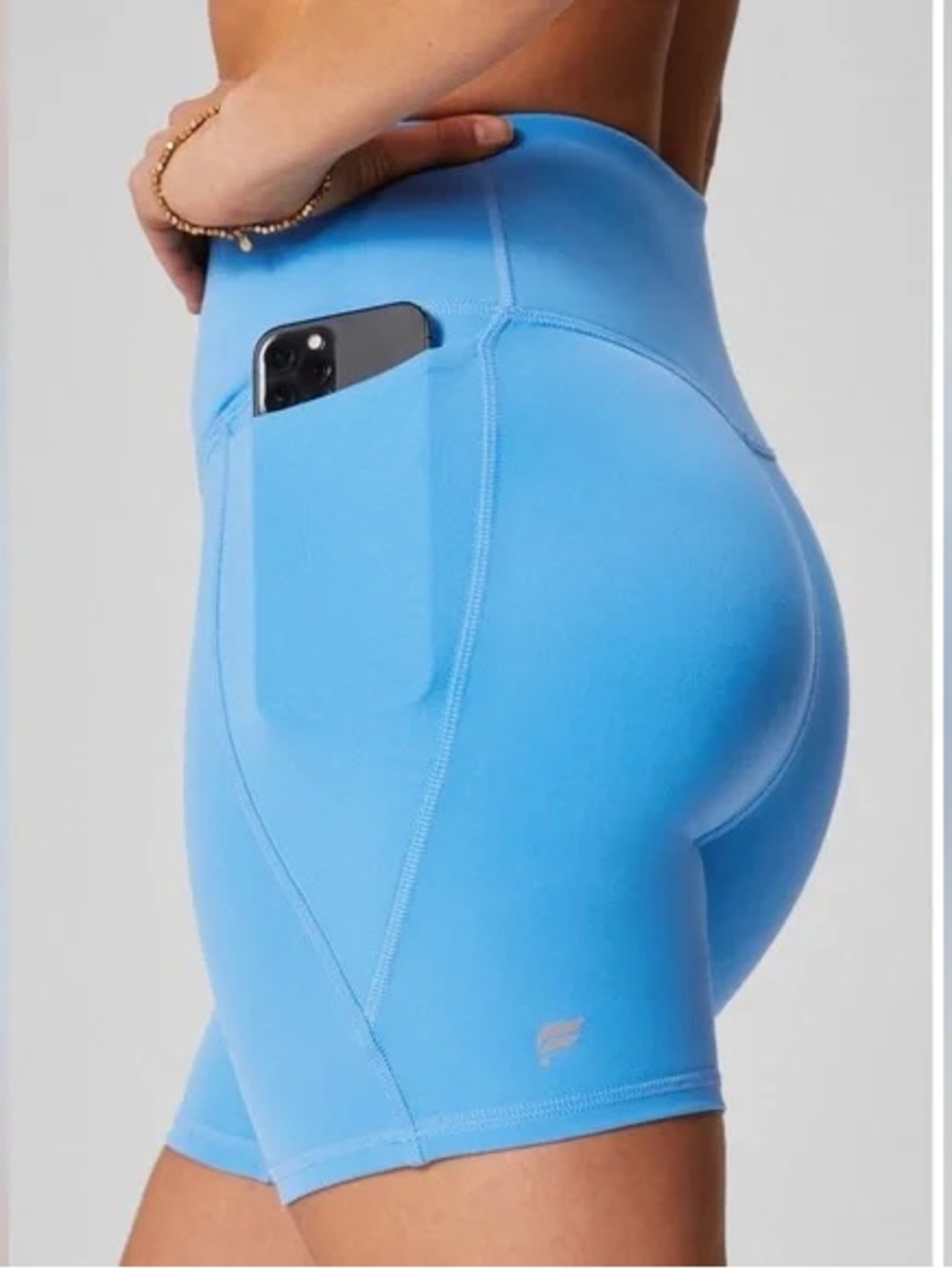 Fabletics Oasis PureLuxe Crossover 6'' Biker Shorts in Cerulean Blue - Picture 3 of 7